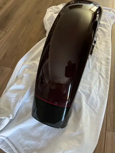Front fender from 2022 Harley Davidson Street Glide Special, midnight crimson & vivid black. Couple...