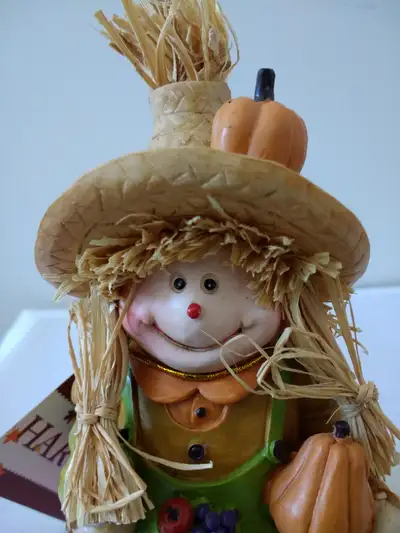 Shelf Scarecrow with dangling legs Approx 7 inch height X 2.75 inch base Legs dangle 4 inches Votive...