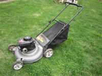 lawn mower with bag.