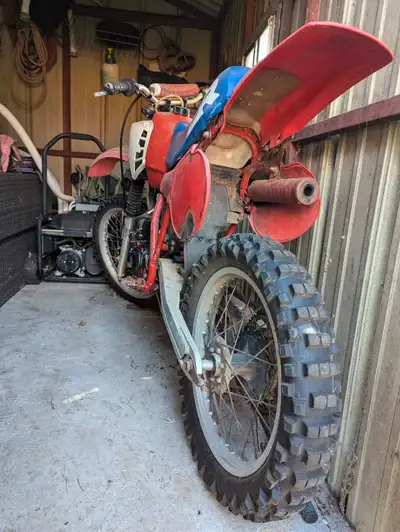 Bike runs good. Top end rebuild only has about 1 hour of riding since rebuild. Comes with extra tire...