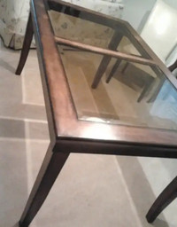 Very nice Wooden table with cristal on top36” wide x 60 “ lengt