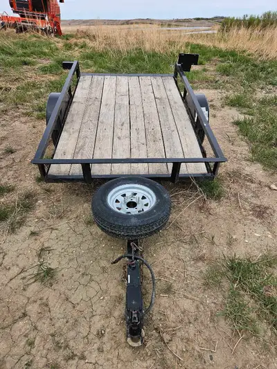 2012 diamond C 5ft by 8ft tilting utility trailer. New 13inch tires.new bearings.and seals. New bear...