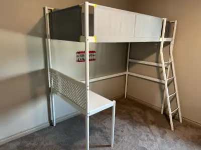 Kids twin bunk bed with desk in good condition. Pick up only. Bed has been taken apart into panels f...