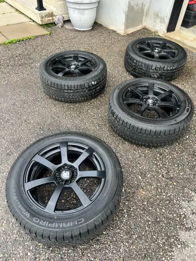 Winter tires 225 60 17,on phat Kat rims 5 bolt pattern , no scuffs or scratches , GT champiro tires...