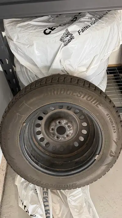 4 Bridgestone blizzak 225/65 R17 tires on black rims. Still like new and only asking for 750$ to mak...