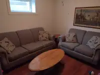 Sofa and love seat and oak tables