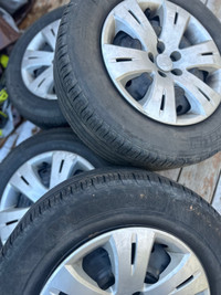 215/65R16x4 all season tires on rims. 