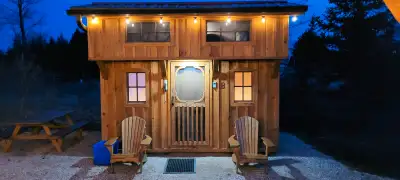 Experience a unique and intimate getaway for two in our charming, wood-stove-heated tiny home. Nestl...