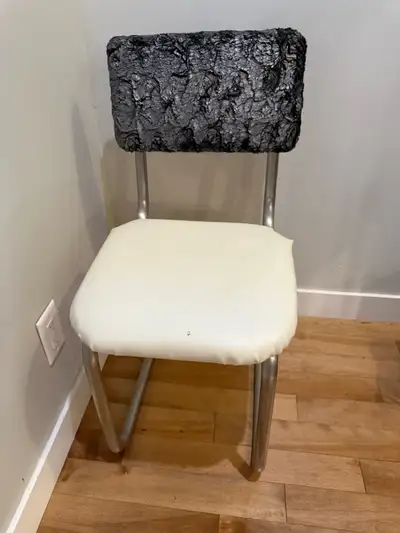 Vintage chrome chair with vinyl seat and plush backrest. Good used condition. $50. Pickup just off o...