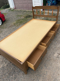 Twin bed with drewers