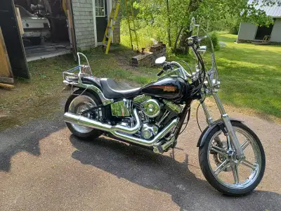 Excellent condition. Two into one Vance & Hines exhaust, custom front wheel, front wheel lock, 200mm...
