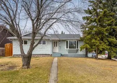 This is a spacious bungalow located on a huge corner lot in the beautiful community of Canyon Meadow...