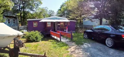 Small room with acces to patio, porch, deck, driveway. All utilities Included in rent Power Internet...