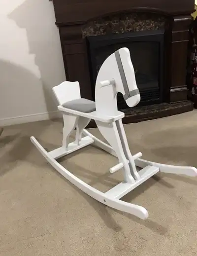 Wooden rocking horse in amazing condition. It was used as a decor in a baby’s room. It would be fant...