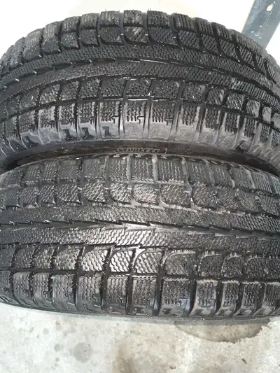 LIKE NEW 2 SNOW TIRES ANTARAS GRIP FROM HONDA CIVIC. DOT 2420 . 95% RUBBER LEFT.