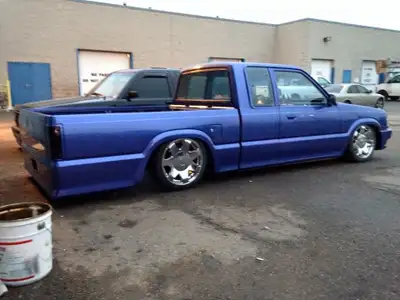 87 Mazda b 2200 extended cab , bagged with ride tech shocks , c notch , three sets of wheels . Camme...