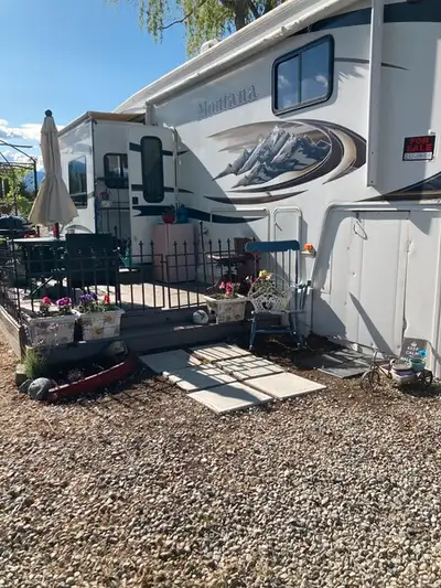 37 ft. RV in beautiful Trout Creek area. A short walk to beach front and walking path along the lake...