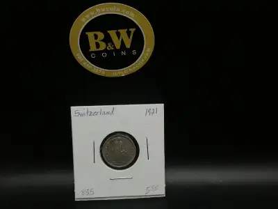 1921 Switzerland 1/2 Fr. .835 Coin $6 The 1921 Switzerland 1/2 Fr. .835 coin is a significant piece...