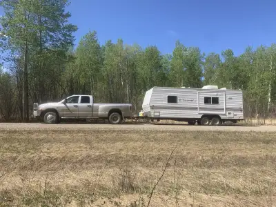 2012 trailer. Third owner. Exterior is faded but interior in good shape. Couch and table turn into a...