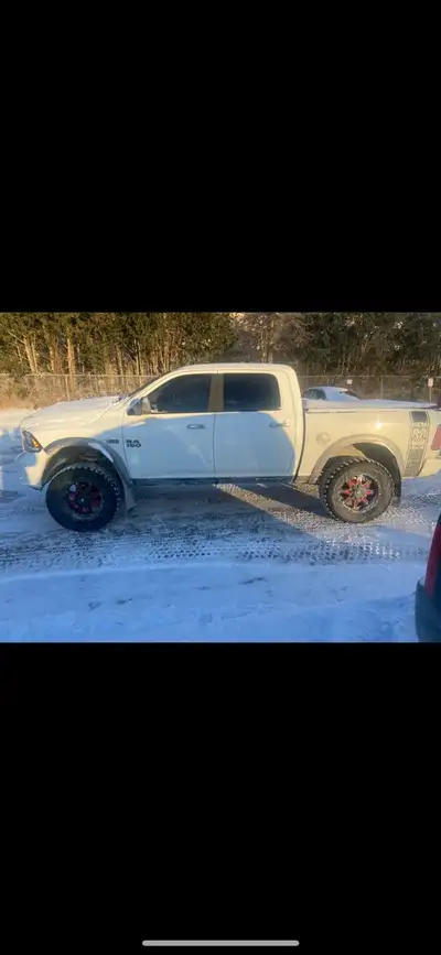 2013 Ram 1500 264061 km 6 inch lift. Has aftermarket grill with led light bar, Upgraded led head lig...