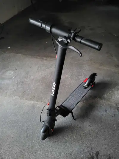 Cruise around town with this sleek electric scooter, featuring a robust motor and long-lasting batte...