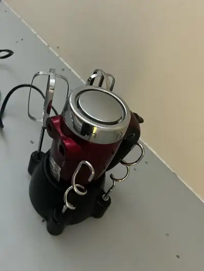 Mix up your baking game with this Betty Crocker hand mixer! It's in good condition and ready to whip...