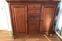 Large wood dresser Leon’s furniture 