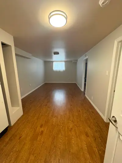 Forget everything you know about dark, cramped basements. This newly sun-filled lower-level suite in...