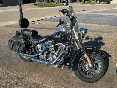I am selling my beautiful 2012 Harley Davidson Heritage Softail Classic. 19,800kms Single family own...