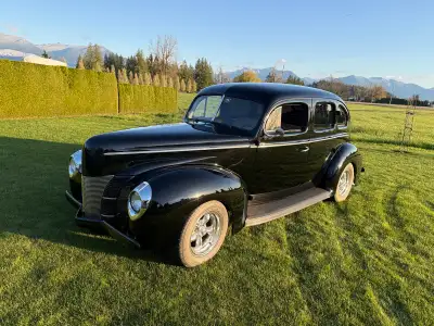 1940 Ford Deluxe with suicide doors. This car has been upgraded with a driveline from a 2006 Mustang...