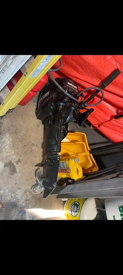 Original owner Mercury 15 hp 2 stroke tiller outboard, sought after, comes with newer tank and new l...