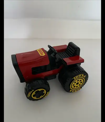 Vintage Tonka Tractor Toy Check out this Tonka tractor, a timeless toy ready to roll into your colle...