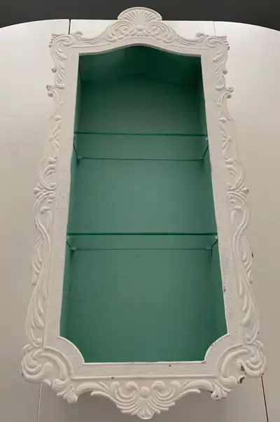 Selling a beautiful antique metal wall display cabinet with two glass shelves. From a clean and smok...