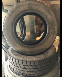 Set of 185/65R14 snow tires with decent tread.