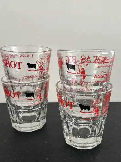 These are four vintage Texas Big Shot Whiskey/low ball/ cocktail Angus Restaurants glasses with a fu...