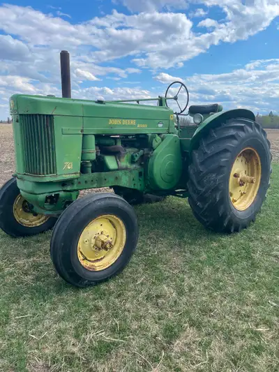 John Deere 620 $6500 John Deere 70D runs good currently working on the clutch and first reduction ge...