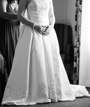 Wedding dress, professionally cleaned and stored in keepsake box. Keepsake box will be included. Pri...