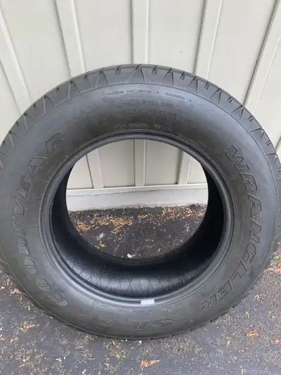 Had a flat so bought 2 new tires and this is the leftover good one. P265/65R18. Off a GMC Sierra