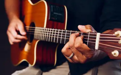 Guitar 6 School of Music -Professional Guitar lessons at affordable Prices -All ages from beginner t...