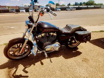 This 2011 Harley Davidson Sportster 883XL is a sleek and stylish motorcycle, perfect for cruising ar...