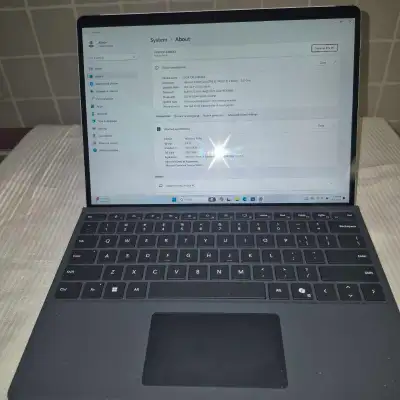 I am selling my gently condition Microsoft Surface Pro 8, a versatile 2-in-1 tablet and laptop that'...