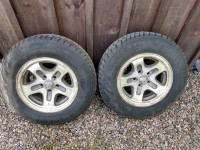 Pair of 225/70R15 M+S used tired on rims