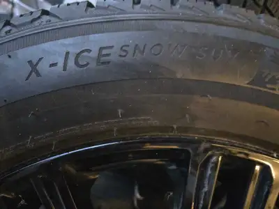 These are Michelin X-Ice Snow SUV tires in size 285/50R20. These tires are in used condition but hav...