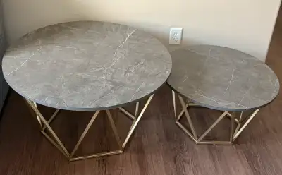 Like new In perfect condition Dimensions: 1 large coffee table Diameter 31.5” height 17.7” 1 small e...