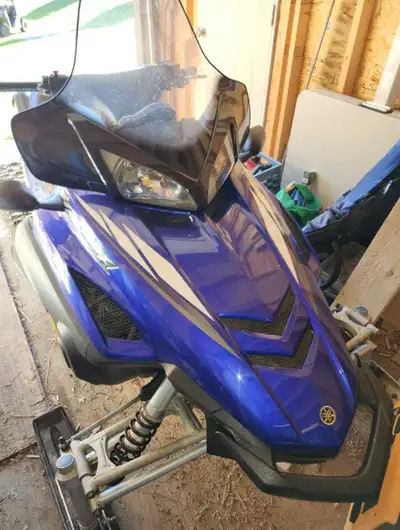 2004 Yamaha RX1 Mint condition Studded track Hand and thumb warmers Electric start Asking $3000 OBO...
