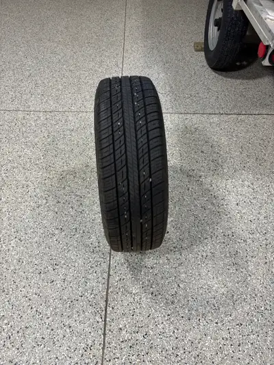 Four Uniroyal Tiger Paw Touring tires on rims 215/60 R16 Approx. 1000kms and like brand new conditio...