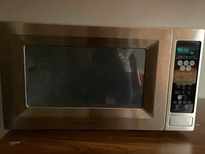 Frigidaire microwave. Full size and full power with turntable. Works great other than occasionally s...