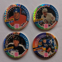 Four Vintage 1993-94 WPF Official NHL Player Hockey Pogs