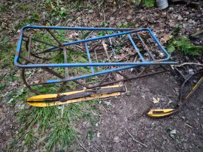 looks homemade, will need sme sort of runners on it, Lots of downhill and cross country skiis on mar...