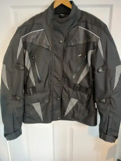 Woman's Motorcycle jacket and pants, View more